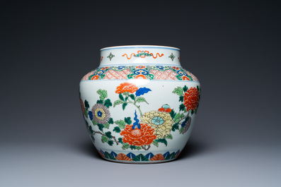 A Chinese wucai vase with floral design, 19th C.