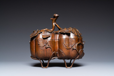 A Chinese bronze censer and cover in the shape of two pumpkins, 19th C.