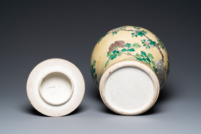 A Chinese yellow-ground verte biscuit vase and cover, 19th C.