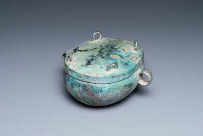 A Chinese archaic bronze 'zhou' bowl and cover, Spring and Autumn period