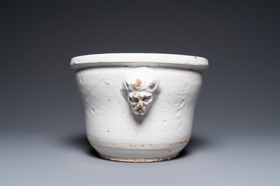 A large monochrome white-glazed French faience fruit bowl, dated August 1770