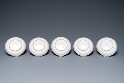 Six Chinese blue and white cups and saucers, six famille rose cups and five saucers, Kangxi/Qianlong