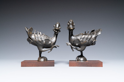 A pair of Chinese bronze 'mandarin ducks' censers, Ming