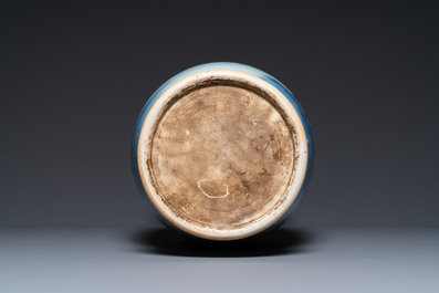 A Chinese blue, white and copper-red vase, 18/19th C.