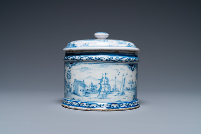 A Dutch Delft blue and white box and cover with fine landscapes, 1st half 18th C.