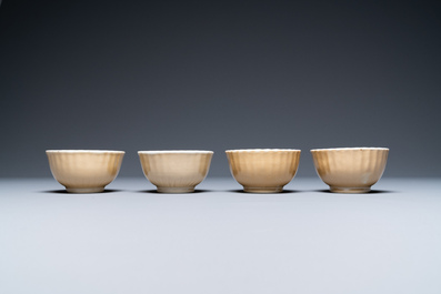 Thirteen Chinese famille rose saucers and twelve cups, Qianlong