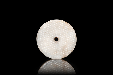 A Chinese white jade bi disc, Han