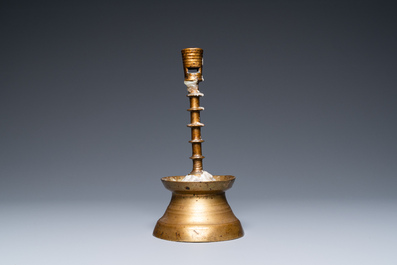 A Flemish or Dutch knotted bronze candlestick, 15th C.