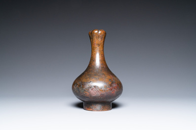 A Chinese bronze garlic-head 'hu' wine vessel, Eastern Zhou/Han