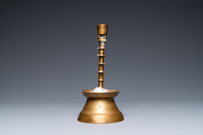 A Flemish or Dutch knotted bronze candlestick, 15th C.