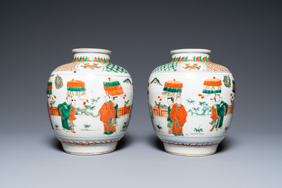 A pair of Chinese famille verte vases on wooden stands, 'hare' mark, 19th C.