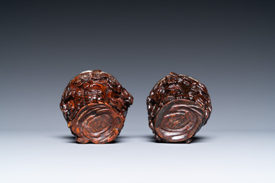 A pair of Chinese silver-lined coconut wine cups, Ming