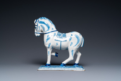 A Dutch Delft blue and white horse, 18th C.