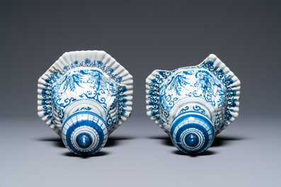 A pair of large ribbed Dutch Delft blue and white covered vases, 1st quarter 18th C.