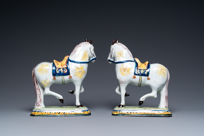 A pair of polychrome Dutch Delft horses, 18th C.