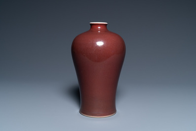 A Chinese monochrome dark copper red meiping vase, Qianlong mark and of the period