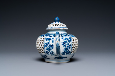 A Chinese blue and white reticulated double-walled teapot and cover, Transitional period