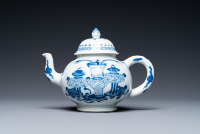 A Chinese blue and white 'antiquities' teapot, Yu mark, Kangxi