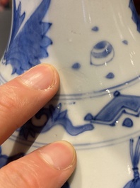 A Chinese blue and white bottle vase depicting four figures, Transitional period