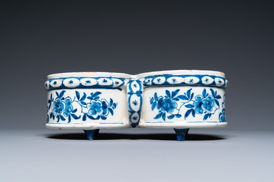 A Dutch Delft blue and white cruet set on stand, 18th C.