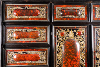 A tortoise veneer, gilt copper, ebony and ebonised wooden mirrored interior cabinet on stand, Antwerp, 17th C.