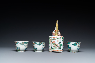 A Chinese famille verte teapot and three cups, Kangxi and later