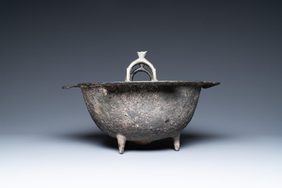 A Persian bronze tripod cauldron, Khorasan, Iran, 12/13th C.