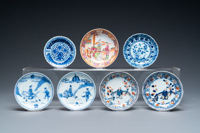 Twenty-two Chinese blue and white and famille rose cups and nineteen saucers, Kangxi and later