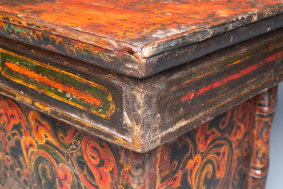 A Tibetan painted and lacquered wooden altar stand, 18th C.