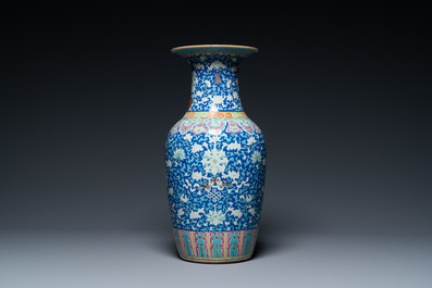 A Chinese famille rose blue-ground 'bajixiang' vase, 19th C.