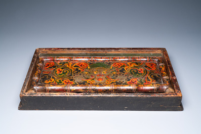 A Tibetan painted and lacquered wooden altar stand, 18th C.