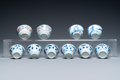 Twenty-two Chinese blue and white and famille rose cups and nineteen saucers, Kangxi and later