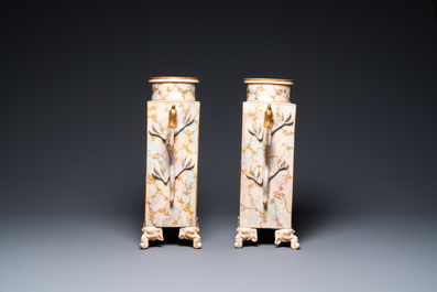 A pair of Japanese Satsuma 'Shimazu Mon' vases on elephant feet, Meiji, 19th C.