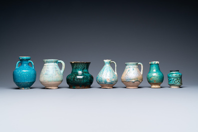 A collection of seven turquoise-glazed jugs and vases, Middle-East, 13th C. and later