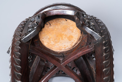 Four Chinese marble-top carved wooden stands, 19/20th C.