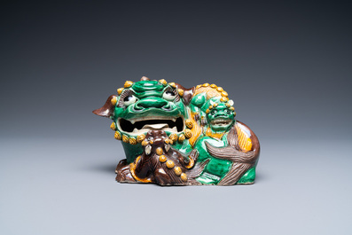 A Chinese verte biscuit model of a Buddhist lion, Kangxi