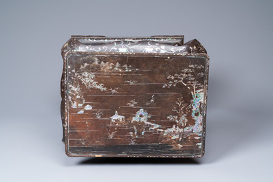 A Chinese mother-of-pearl-inlaid lacquered wooden stand, Kangxi