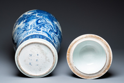 A massive Japanese blue and white Seto vase and cover with shishi and an eagle, Meiji, 19th C.