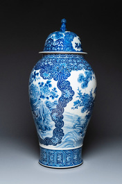 A massive Japanese blue and white Seto vase and cover with shishi and an eagle, Meiji, 19th C.