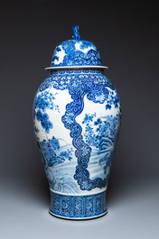 A massive Japanese blue and white Seto vase and cover with shishi and an eagle, Meiji, 19th C.