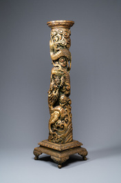 A large Chinese gilded wooden 'dragon' stand, 19th C.