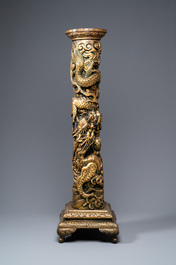 A large Chinese gilded wooden 'dragon' stand, 19th C.