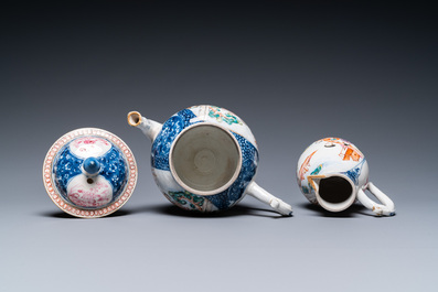 A Chinese famille rose 'Mandarin' teapot and milk jug, Qianlong