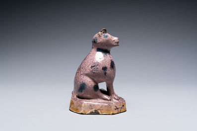 A manganese faience model of a cat, North of France, 18/19th C.