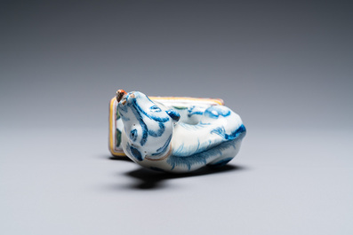 A polychrome Dutch Delft dog, 18th C.