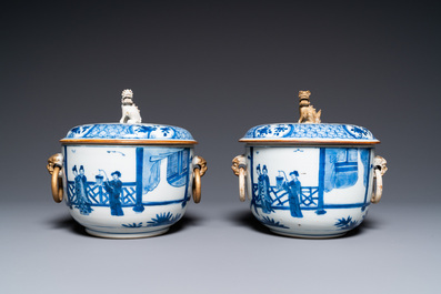 A pair of Chinese blue and white covered bowls, 19th C.