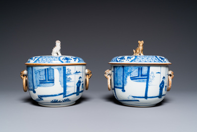 A pair of Chinese blue and white covered bowls, 19th C.