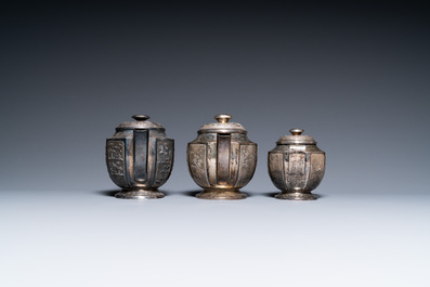 Two Vietnamese silver teapots and a sugar bowl and cover, marked Donghung, ca. 1900