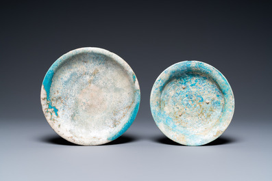 Two turquoise- and black-glazed dishes, three bowls, a jug and a small lion, Raqqa and Nishapur, Middle-East, 12/13th C. and later