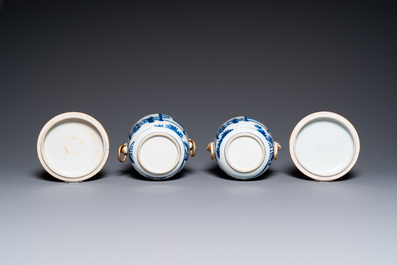 A pair of Chinese blue and white covered bowls, 19th C.